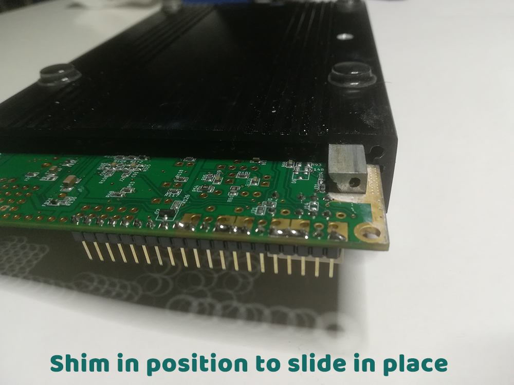 Shim-in-position-to-slide-in-place